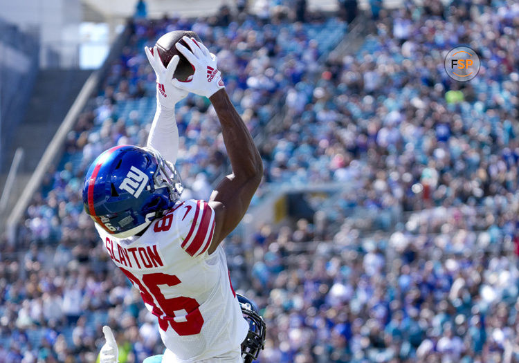 JACKSONVILLE, FL - OCTOBER 23: New York Giants wide receiver Darius Slayton (86) receive a catch in the end zone for a touchdown on their opening drive during the NFL Football match between the Jacksonville Jaguars and New York Giants on October 23, 2022 at TIAA Bank Field, FL. (Photo by Andrew Bershaw/Icon Sportswire)