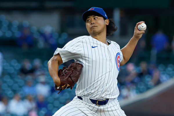 Sep 4, 2024; Chicago, Illinois, USA; Chicago Cubs starting pitcher Shota Imanaga (18) delivers a pitch against the Pittsburgh Pirates during the first inning at Wrigley Field. Mandatory Credit: Kamil Krzaczynski-Imagn Images