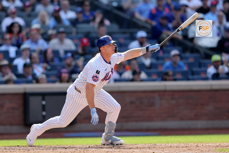 Apr 23, 2025; New York City, New York, USA; New York Mets first baseman Pete Alonso (20) watches his game tying RBI double against the Philadelphia Phillies during the tenth inning at Citi Field. Credit: Brad Penner-Imagn Images