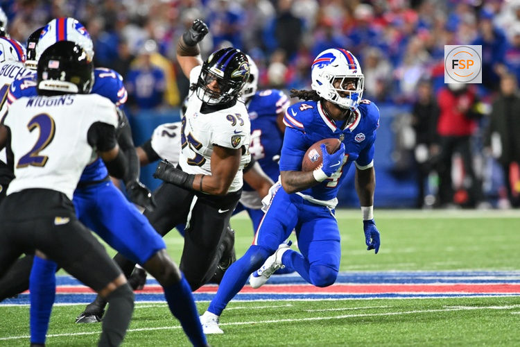 Sep 7, 2025; Orchard Park, New York, USA;  Buffalo Bills running back James Cook (4) runs the ball during the third quarter against the Baltimore Ravens at Highmark Stadium. Credit: Mark Konezny-Imagn Images