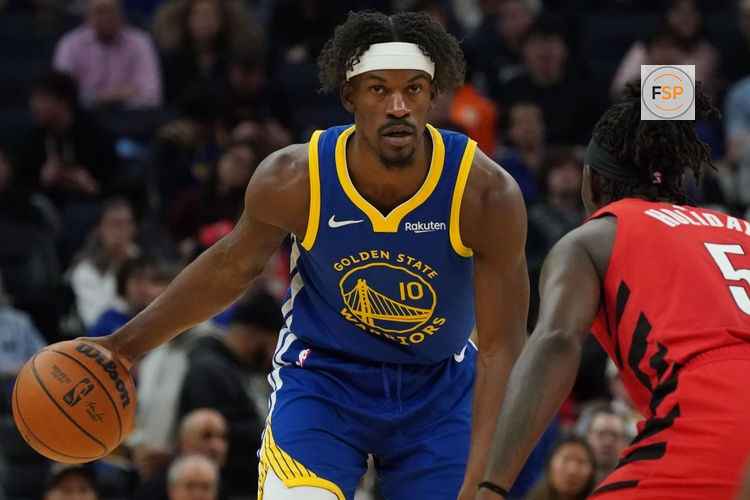 Jan 13, 2026; San Francisco, California, USA;  Golden State Warriors forward Jimmy Butler III (10) dribbles against Portland Trail Blazers guard Jrue Holiday (5) in the third quarter at Chase Center. Credit: David Gonzales-Imagn Images