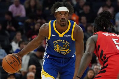 Jan 13, 2026; San Francisco, California, USA;  Golden State Warriors forward Jimmy Butler III (10) dribbles against Portland Trail Blazers guard Jrue Holiday (5) in the third quarter at Chase Center. Mandatory Credit: David Gonzales-Imagn Images