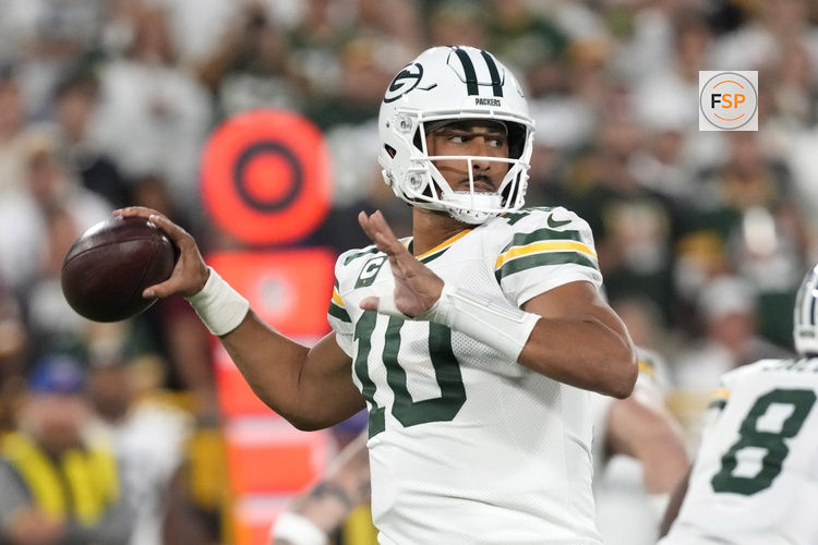 Sep 11, 2025; Green Bay, Wisconsin, USA; Green Bay Packers quarterback Jordan Love (10) passes against the Washington Commanders in the first quarter at Lambeau Field. Credit: Jeff Hanisch-Imagn Images