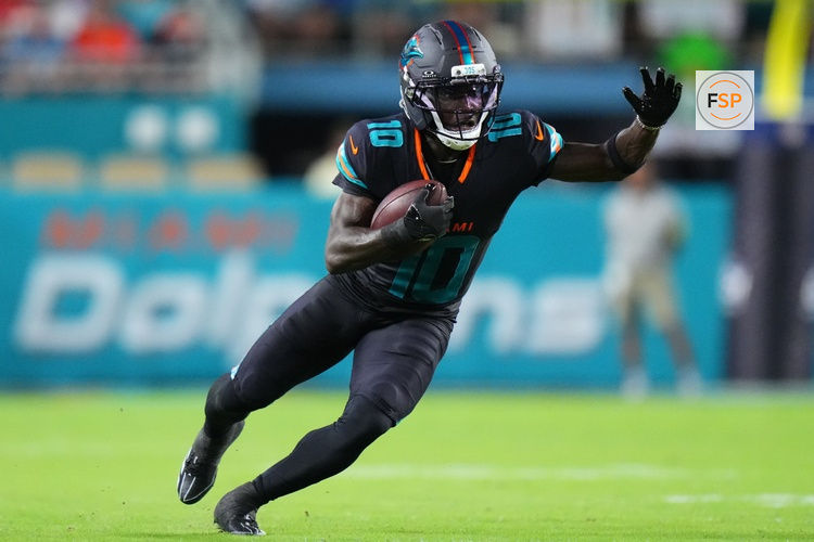 Sep 29, 2025; Miami Gardens, Florida, USA; Miami Dolphins wide receiver Tyreek Hill (10) makes a catch against the New York Jets during the first half at Hard Rock Stadium. Credit: Rich Storry-Imagn Images