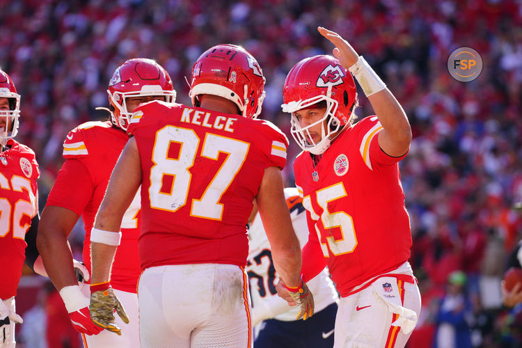 Nov 10, 2024; Kansas City, Missouri, USA; Kansas City Chiefs tight end Travis Kelce (87) celebrates with quarterback Patrick Mahomes (15) after scoring against the Denver Broncos during the first half at GEHA Field at Arrowhead Stadium. Credit: Denny Medley-Imagn Images