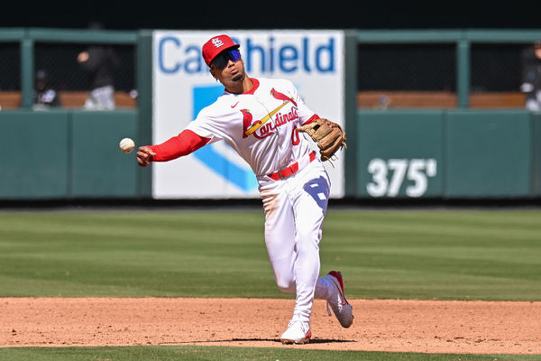 ST. LOUIS, MO - Apr 6: St. Louis Cardinals shortstop Masyn Winn (0) throws over to first base during the 6th inning warm ups during a game between the Miami Marlins and the St. Louis Cardinals on Saturday April 6, 2024, at Busch Stadium in St. Louis MO (Photo by Rick Ulreich/Icon Sportswire)