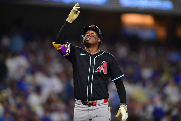 May 19, 2025; Los Angeles, California, USA; Arizona Diamondbacks shortstop Geraldo Perdomo (2) reacts after hitting a solo home run against the Los Angeles Dodgers during the eighth inning at Dodger Stadium. Mandatory Credit: Gary A. Vasquez-Imagn Images