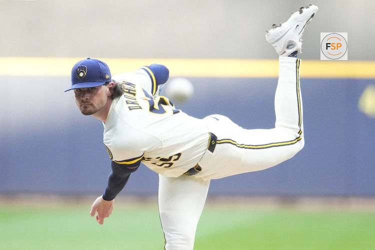 Jul 1, 2026; Milwaukee, Wisconsin, USA; Milwaukee Brewers pitcher Shane Drohan (55) delivers a pitch against the Cincinnati Reds in the first inning at American Family Field. Credit: Michael McLoone-Imagn Images