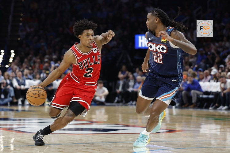 Mar 27, 2026; Oklahoma City, Oklahoma, USA; Chicago Bulls guard Collin Sexton (2) drives around Oklahoma City Thunder guard Cason Wallace (22) during the second half at Paycom Center. Credit: Alonzo Adams-Imagn Images