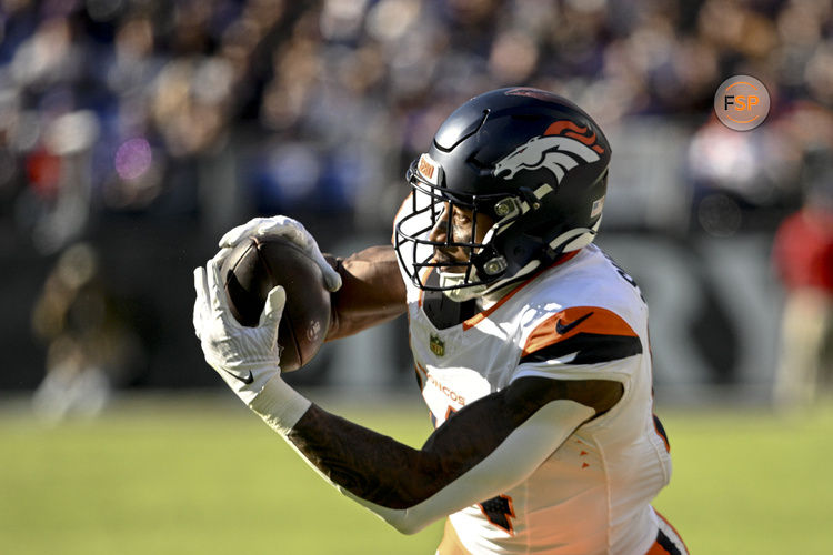 Nov 3, 2024; Baltimore, Maryland, USA;  Denver Broncos wide receiver Courtland Sutton (14) catches a pass during the first half against the Baltimore Ravens at M&T Bank Stadium. Credit: Tommy Gilligan-Imagn Images