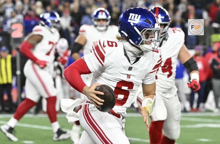 Dec 1, 2025; Foxborough, Massachusetts, USA; New York Giants quarterback Jaxson Dart (6) carries the ball during the first quarter against the New England Patriots at Gillette Stadium. Credit: Eric Canha-Imagn Images