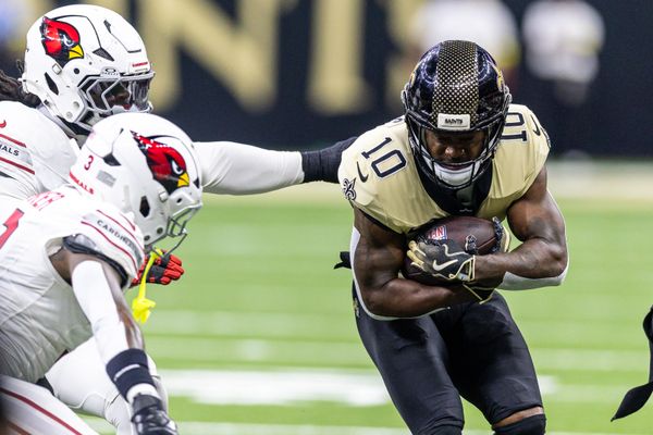 Sep 7, 2025; New Orleans, Louisiana, USA; New Orleans Saints wide receiver Brandin Cooks (10) is tackled by the Arizona Cardinals during the second half at Caesars Superdome. Mandatory Credit: Stephen Lew-Imagn Images