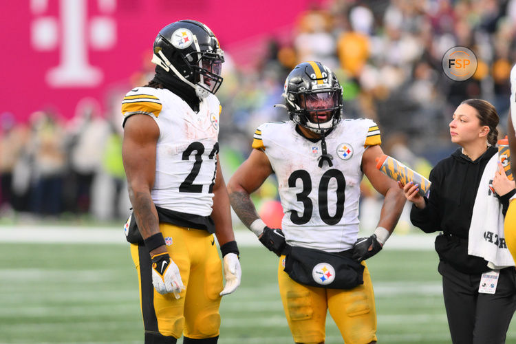 Dec 31, 2023; Seattle, Washington, USA; Pittsburgh Steelers running back Najee Harris (22) and Pittsburgh Steelers running back Jaylen Warren (30) during the second half against the Seattle Seahawks at Lumen Field. Mandatory Credit: Steven Bisig-USA TODAY Sports