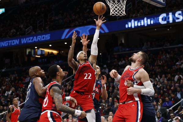 Jan 19, 2026; Washington, District of Columbia, USA; LA Clippers guard Jordan Miller (22) shoots the ball in front of Washington Wizards forward Kyshawn George (18) in the second half at Capital One Arena. Mandatory Credit: Geoff Burke-Imagn Images