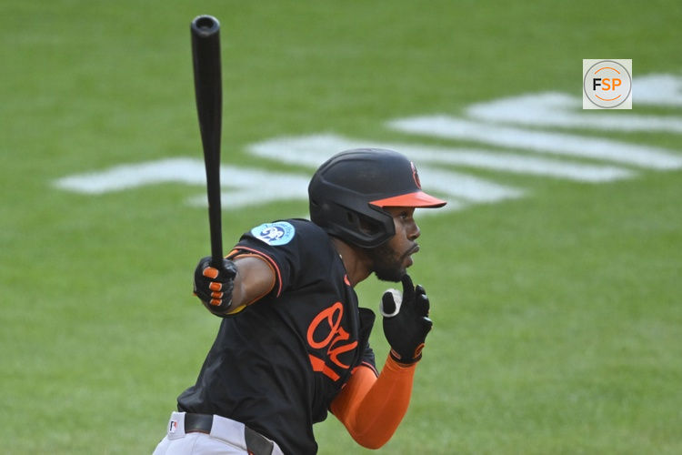 Jul 23, 2025; Cleveland, Ohio, USA; Baltimore Orioles center fielder Cedric Mullins (31) doubles in the third inning against the Cleveland Guardians at Progressive Field. Credit: David Richard-Imagn Images