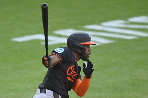 Jul 23, 2025; Cleveland, Ohio, USA; Baltimore Orioles center fielder Cedric Mullins (31) doubles in the third inning against the Cleveland Guardians at Progressive Field. Mandatory Credit: David Richard-Imagn Images