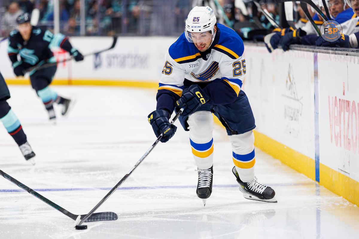 Oct 8, 2024; Seattle, Washington, USA; St. Louis Blues center Jordan Kyrou (25) skates with the puck against the Seattle Kraken during the second period at Climate Pledge Arena. Credit: Caean Couto-Imagn Images