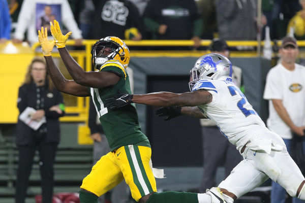 GREEN BAY, WI - SEPTEMBER 28:  Green Bay Packers wide receiver Jayden Reed (11) makes a catch during a game between the Green Bay Packers and the Detroit Lions on September 28, 2023 at Lambeau Field in Green Bay, WI. (Photo by Larry Radloff/Icon Sportswire)