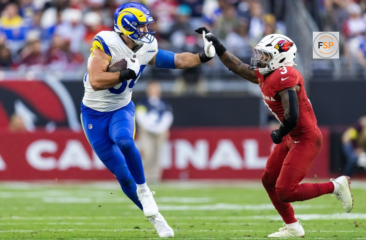 Dec 7, 2025; Glendale, Arizona, USA; Los Angeles Rams  tight end Colby Parkinson (84) against Arizona Cardinals safety Budda Baker (3) at State Farm Stadium. Credit: Mark J. Rebilas-Imagn Images