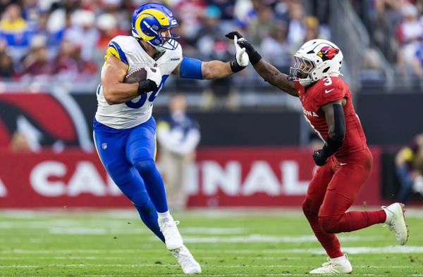 Dec 7, 2025; Glendale, Arizona, USA; Los Angeles Rams  tight end Colby Parkinson (84) against Arizona Cardinals safety Budda Baker (3) at State Farm Stadium. Mandatory Credit: Mark J. Rebilas-Imagn Images