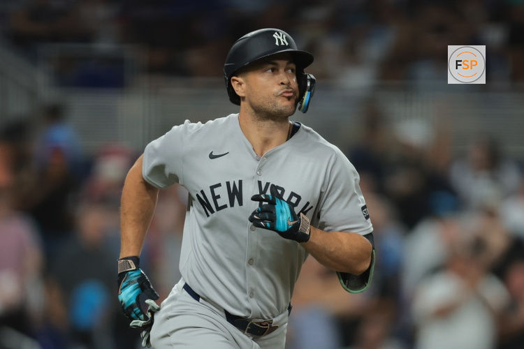 Aug 1, 2025; Miami, Florida, USA; New York Yankees designated hitter Giancarlo Stanton (27) circles the bases after hitting a three-run home run against the Miami Marlins during the fourth inning at loanDepot Park. Credit: Sam Navarro-Imagn Images