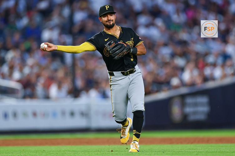 Jul 20, 2026; Bronx, New York, USA; Pittsburgh Pirates third baseman Nick Gonzales (3) throws the ball to first base a ground ball hit by New York Yankees catcher Austin Wells (not pictured) during the third inning at Yankee Stadium. Credit: Vincent Carchietta-Imagn Images