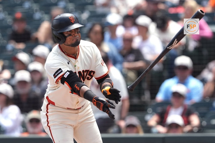 Jul 12, 2026; San Francisco, California, USA; San Francisco Giants second baseman Luis Arraez (1) tosses his bat after drawing a walk against the Colorado Rockies during the third inning at Oracle Park. Credit: Darren Yamashita-Imagn Images