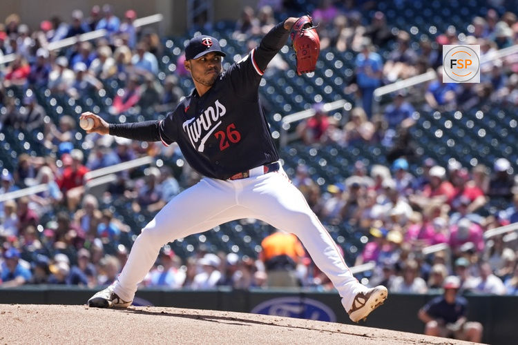 Jun 14, 2026; Minneapolis, Minnesota, USA; Minnesota Twins starting pitcher Taj Bradley (26) throws to the St. Louis Cardinals in the second inning at Target Field. Credit: Bruce Kluckhohn-Imagn Images