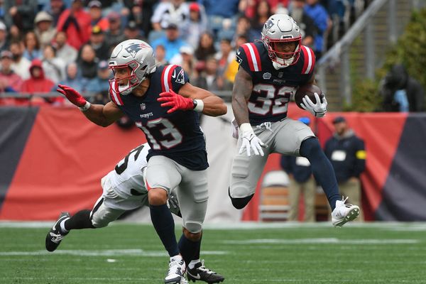 Sep 7, 2025; Foxborough, Massachusetts, USA; New England Patriots running back TreVeyon Henderson (32) rushes the ball against the Las Vegas Raiders during the first half at Gillette Stadium. Mandatory Credit: Bob DeChiara-Imagn Images