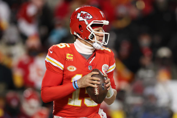 KANSAS CITY, MO - JANUARY 13: Kansas City Chiefs quarterback Patrick Mahomes (15) drops back to pass in the fourth quarter of an AFC Wild Card playoff game between the Miami Dolphins and Kansas City Chiefs on Jan 13, 2024 at GEHA Field at Arrowhead Stadium in Kansas City, MO. (Photo by Scott Winters/Icon Sportswire)