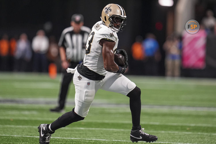 Sep 29, 2024; Atlanta, Georgia, USA; New Orleans Saints tight end Juwan Johnson (83) catches a pass against the Atlanta Falcons during the second half at Mercedes-Benz Stadium. Credit: Dale Zanine-Imagn Images