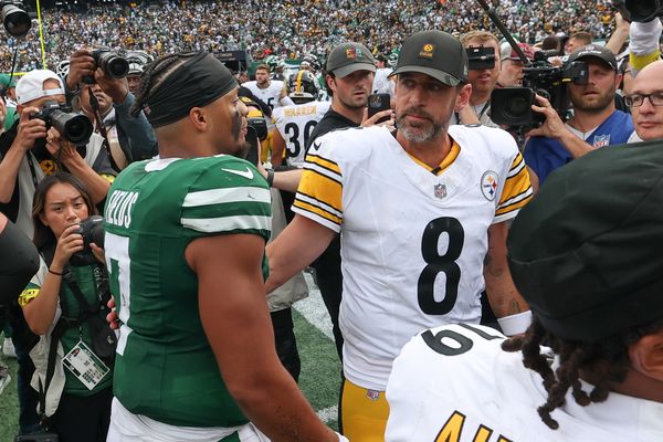 Sep 7, 2025; East Rutherford, New Jersey, USA; New York Jets quarterback Justin Fields (7) greets Pittsburgh Steelers quarterback Aaron Rodgers (8) after the game at MetLife Stadium. Mandatory Credit: Wendell Cruz-Imagn Images