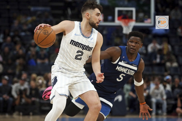 Feb 2, 2026; Memphis, Tennessee, USA; Memphis Grizzlies guard Ty Jerome (2) dribbles as Minnesota Timberwolves guard Anthony Edwards (5) defends during the first quarter at FedExForum. Credit: Petre Thomas-Imagn Images