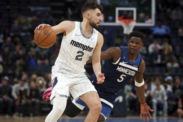 Feb 2, 2026; Memphis, Tennessee, USA; Memphis Grizzlies guard Ty Jerome (2) dribbles as Minnesota Timberwolves guard Anthony Edwards (5) defends during the first quarter at FedExForum. Mandatory Credit: Petre Thomas-Imagn Images