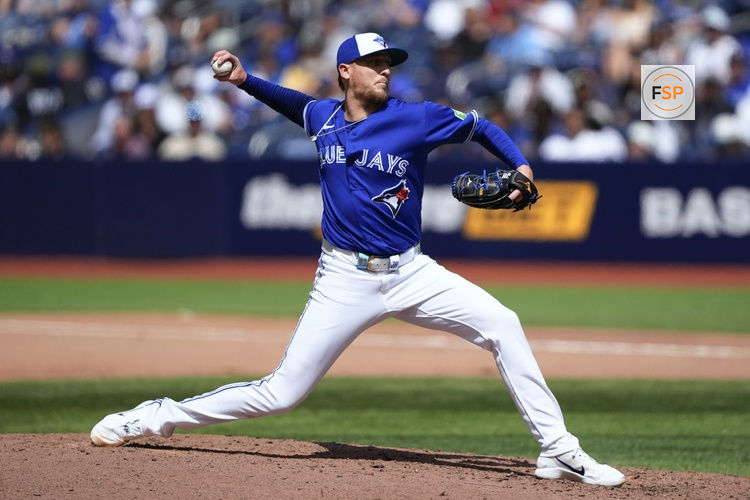 May 27, 2026; Toronto, Ontario, CAN; Toronto Blue Jays pitcher Jeff Hoffman (23) pitches to the Miami Marlins during the seventh inning at Rogers Centre. Credit: John E. Sokolowski-Imagn Images
