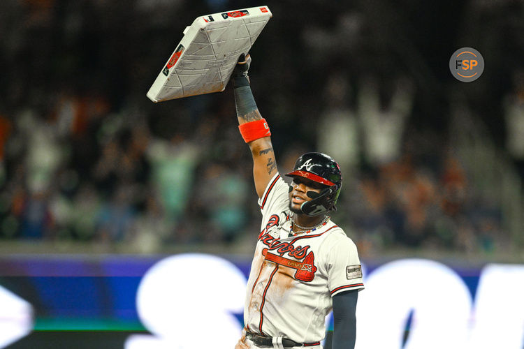 ATLANTA, GA – SEPTEMBER 27:  Atlanta right fielder Ronald Acuna Jr. (13) reacts after stealing his 70th base of the season during the MLB game between the Chicago Cubs and the Atlanta Braves on September 27th, 2023 at Truist Park in Atlanta, GA. (Photo by Rich von Biberstein/Icon Sportswire)