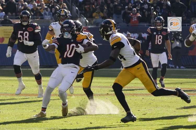 Nov 23, 2025; Chicago, Illinois, USA; Chicago Bears wide receiver Luther Burden III (10) is tackled after a catch Pittsburgh Steelers cornerback Jalen Ramsey (5) during the first half at Soldier Field. Credit: David Banks-Imagn Images