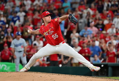 Aug 17, 2024; St. Louis, Missouri, USA; St. Louis Cardinals pitcher Ryan Helsley (56) throws the final strike for the final out of the game against the Los Angeles Dodgers at Busch Stadium in the ninth inning. Mandatory Credit: Tim Vizer-USA TODAY Sports