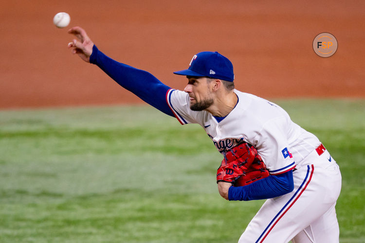 ARLINGTON, TX - OCTOBER 10: Texas Rangers starting pitcher Nathan Eovaldi (17) shows a pitch during game 3 of the ALDS between the Baltimore Orioles and the Texas Rangers on October 10, 2023, at Globe Life Field in Arlington, TX. (Photo by Chris Leduc/Icon Sportswire)