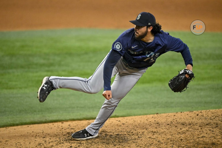 Sep 22, 2024; Arlington, Texas, USA; Seattle Mariners relief pitcher Andres Munoz (75) pitches against the Texas Rangers during the ninth inning at Globe Life Field. Credit: Jerome Miron-Imagn Images