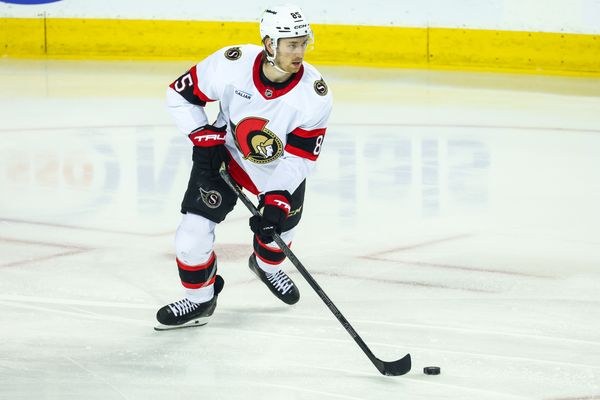 Mar 5, 2026; Calgary, Alberta, CAN; Ottawa Senators defenseman Jake Sanderson (85) skates with the puck against the Calgary Flames during the first period at Scotiabank Saddledome. Mandatory Credit: Sergei Belski-Imagn Images