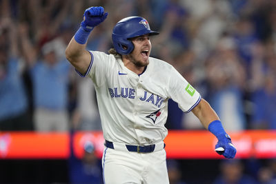 Jul 5, 2025; Toronto, Ontario, CAN; Toronto Blue Jays right fielder Addison Barger (47) reacts after hitting a walk off single against the Los Angeles Angels during the 11th inning at Rogers Centre. Mandatory Credit: John E. Sokolowski-Imagn Images