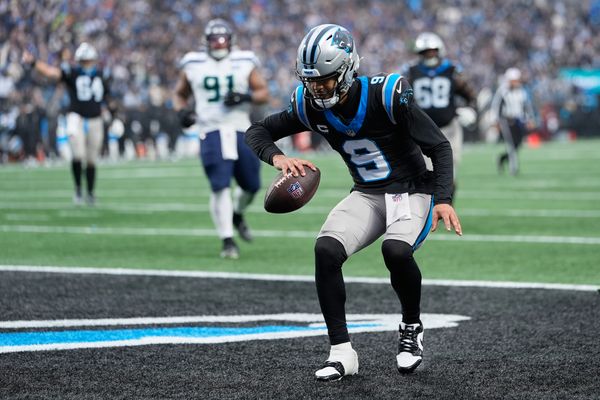 Dec 28, 2025; Charlotte, North Carolina, USA; Carolina Panthers quarterback Bryce Young (9) reacts after scoring a ten-yard rushing touchdown against the Seattle Seahawks during the third quarter at Bank of America Stadium. Mandatory Credit: Jim Dedmon-Imagn Images