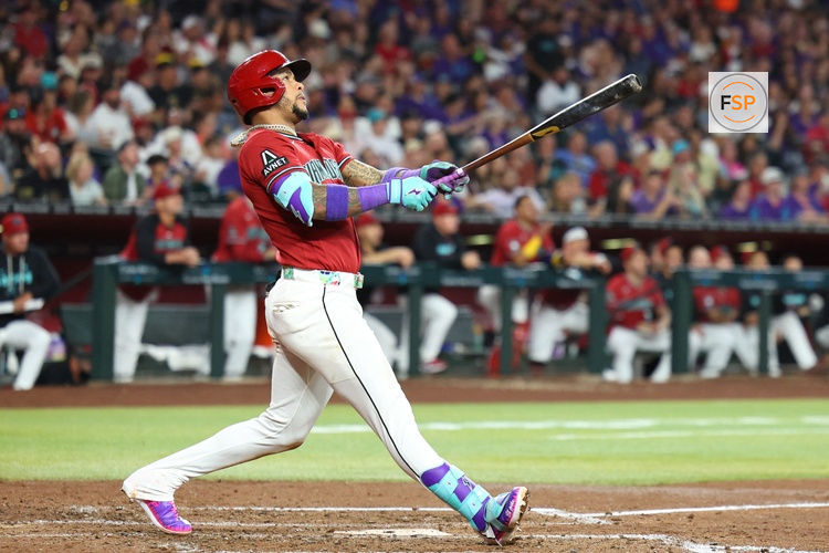 May 23, 2026; Phoenix, Arizona, USA; Arizona Diamondbacks second baseman Ketel Marte (4) watches after hitting a two run home run against Colorado Rockies starting pitcher Michael Lorenzen (24) during the fourth inning at Chase Field. Credit: Anna Carrington-Imagn Images
