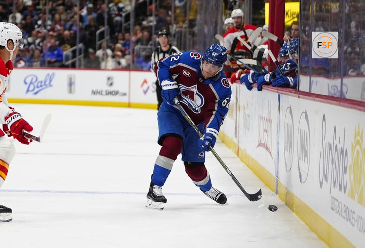 Mar 30, 2026; Denver, Colorado, USA; Colorado Avalanche left wing Artturi Lehkonen (62) passes the puck in the second period against the Calgary Flames at Ball Arena. Credit: Ron Chenoy-Imagn Images