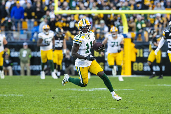 PITTSBURGH, PA - NOVEMBER 12: Green Bay Packers wide receiver Jayden Reed (11) runs with the ball during the regular season NFL football game between the Green Bay Packers and Pittsburgh Steelers on November 12, 2023 at Acrisure Stadium in Pittsburgh, PA. (Photo by Mark Alberti/Icon Sportswire)