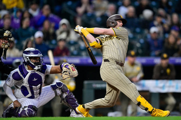 DENVER, CO - APRIL 23: San Diego Padres first base Jake Cronenworth (9) hits a second inning single during a game between the San Diego Padres and the Colorado Rockies at Coors Field on April 23, 2024 in Denver, Colorado. (Photo by Dustin Bradford/Icon Sportswire)