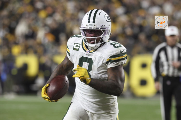 Oct 26, 2025; Pittsburgh, Pennsylvania, USA;  Green Bay Packers running back Josh Jacobs (8) runs the ball against the Pittsburgh Steelers during the fourth quarter against at Acrisure Stadium. Credit: Charles LeClaire-Imagn Images