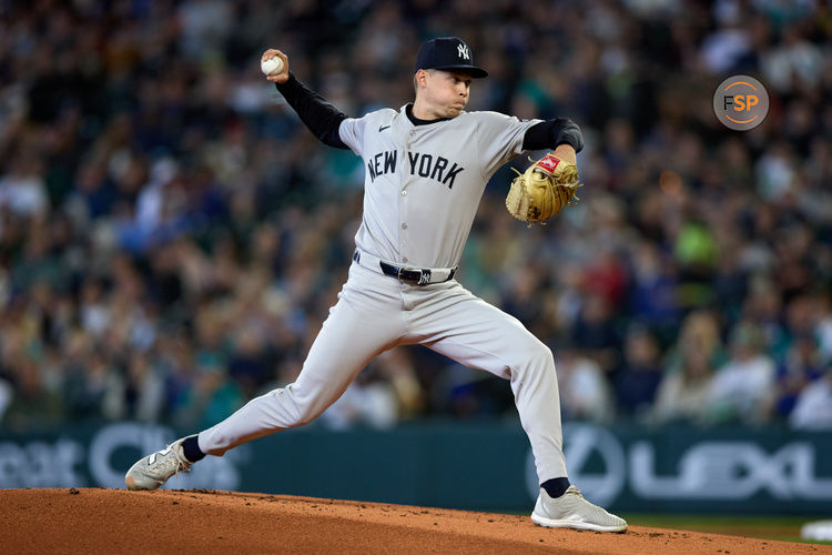 May 14, 2025; Seattle, Washington, USA; New York Yankees pitcher Will Warren (98) throws against the Seattle Mariners during the first inning at T-Mobile Park. Credit: John Froschauer-Imagn Images