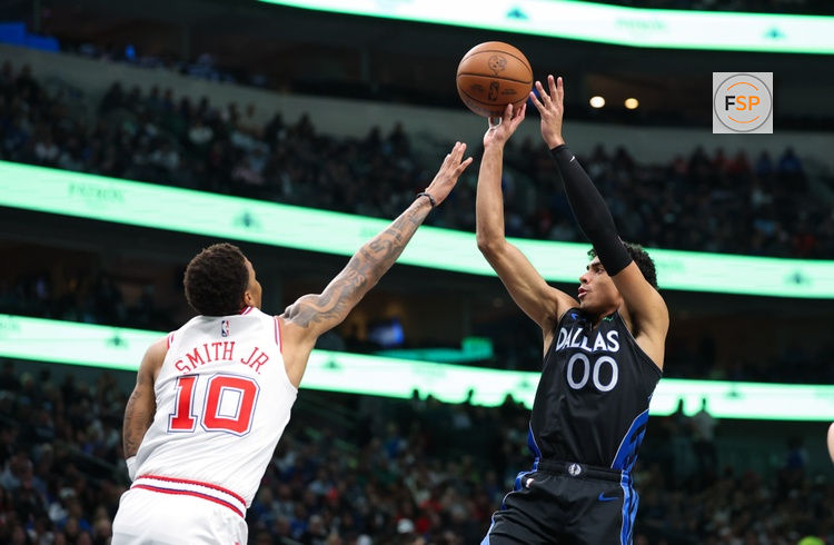 Jan 3, 2026; Dallas, Texas, USA; Dallas Mavericks guard Max Christie (00) shoots over Houston Rockets forward Jabari Smith Jr. (10) during the second half at American Airlines Center. Credit: Kevin Jairaj-Imagn Images